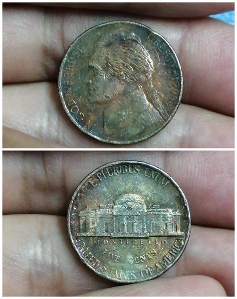 missing​ clad​ layer, 5​ cent​ Jefferson​ 1995​ coin.