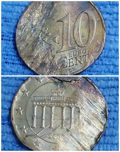 Struck​ through, 10​ euro​ cent​ Germany​ 2002​ j​ coin.