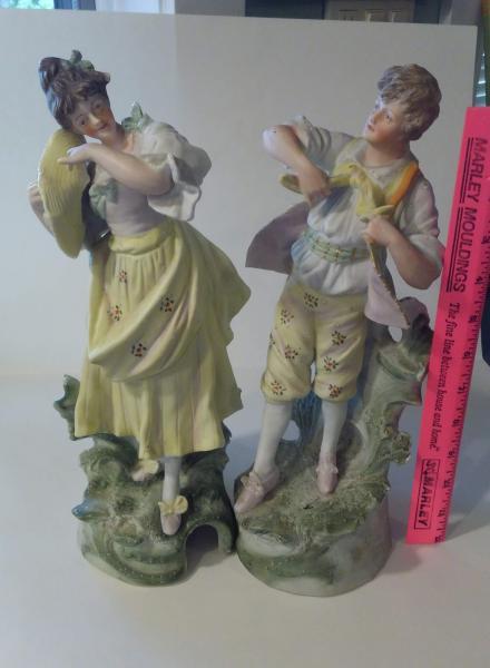 Pair of statues, approximately 15" tall, good condition