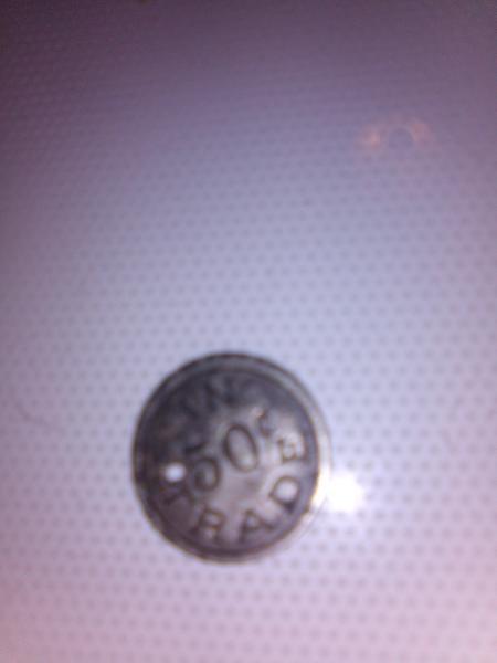 COIN FRONT: IN 50¢ TRADE HAS A HOLE NEXT TO&hellip;