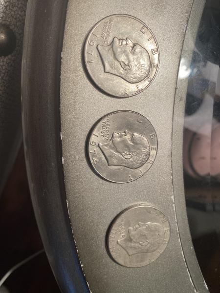 Hi I have (3) Eisenhower one dollar coins.…