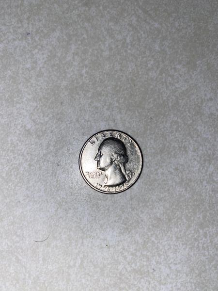 1967 Bicentennial Quarter with a smashed D I…