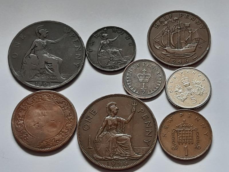Hi, here are some more British coins. I'd…