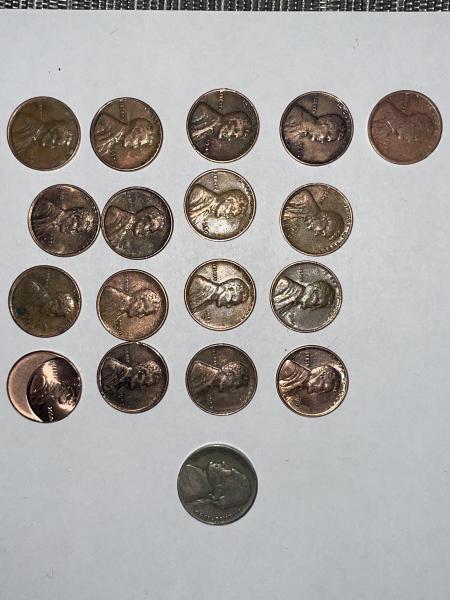 Old pennies and a nickel from 1945