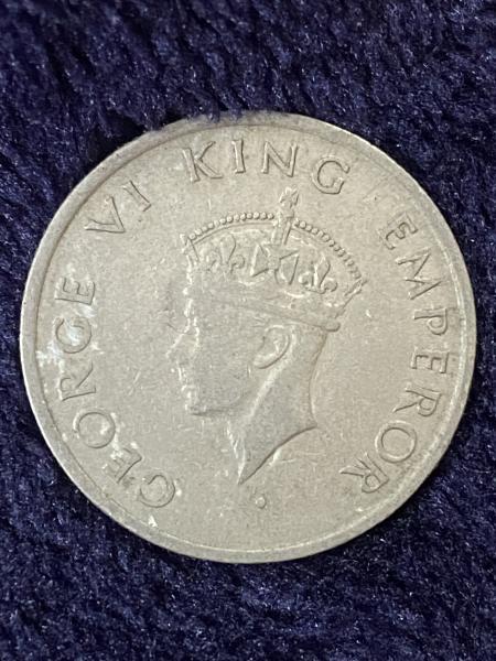 The 1946 (rupee) coin with George VI insignia