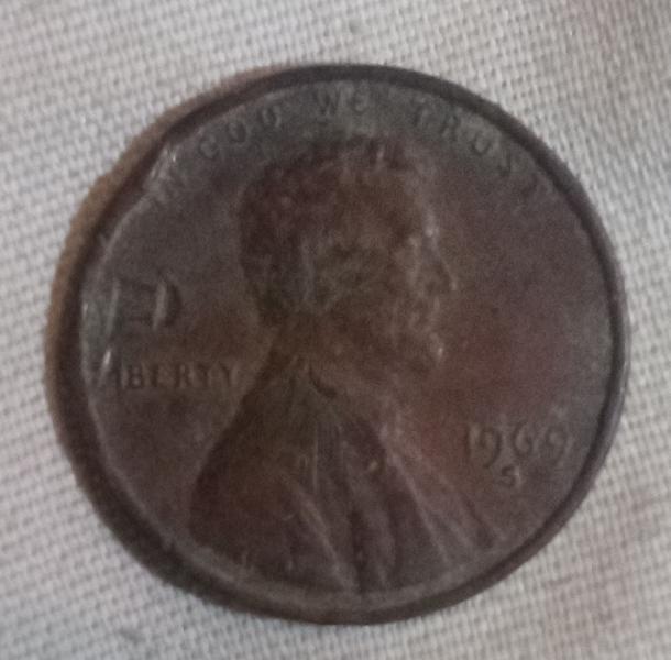 Looks like a bullet going towards the back Lincoln head.&hellip;
