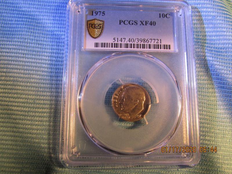 1975 Roosevelt Dime including errors and graded by…