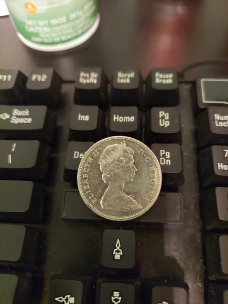 1965 Elizabeth Dollar. It has the Voyagers on the back.&hellip;