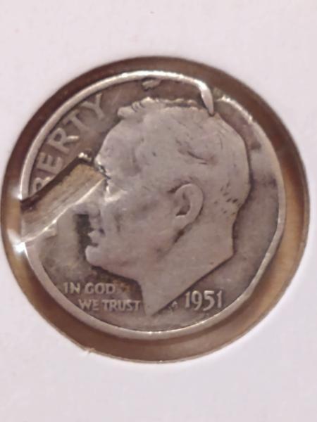 It's a 1951 - d Dime with what…