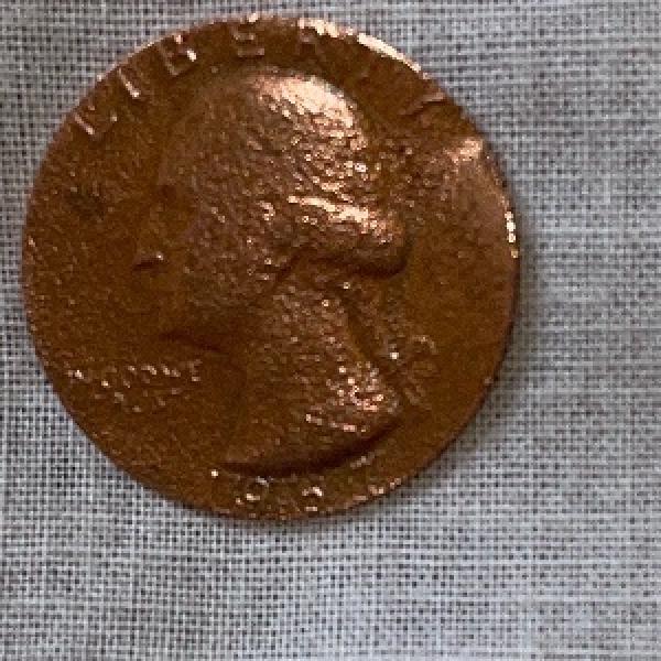 Is this an error quarter coin? It’s copper&hellip;