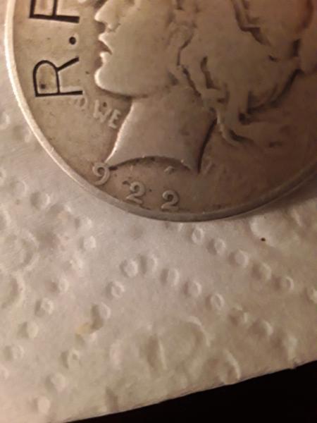 1922 silver dollar missing the 1 in the…