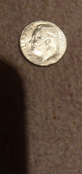1999 dime with strange lines