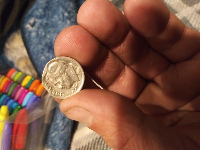 I believe this may be a mis-struck dime...…