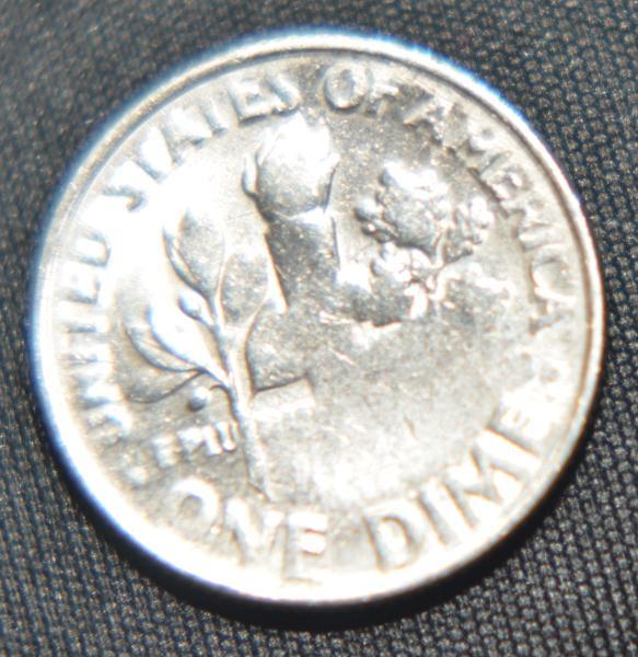 Dime Mint error. Obverse: Roosevelt is bald. Reverse:&hellip;