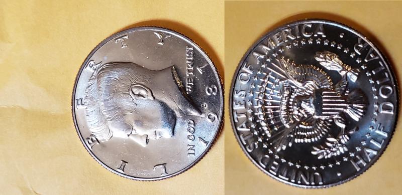 Uncirculated1987 d kennedy half dollar I believe this…