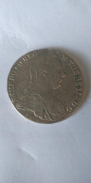 1780 Austrian coin, possibly silver, with golden color Doesn't seem&hellip;