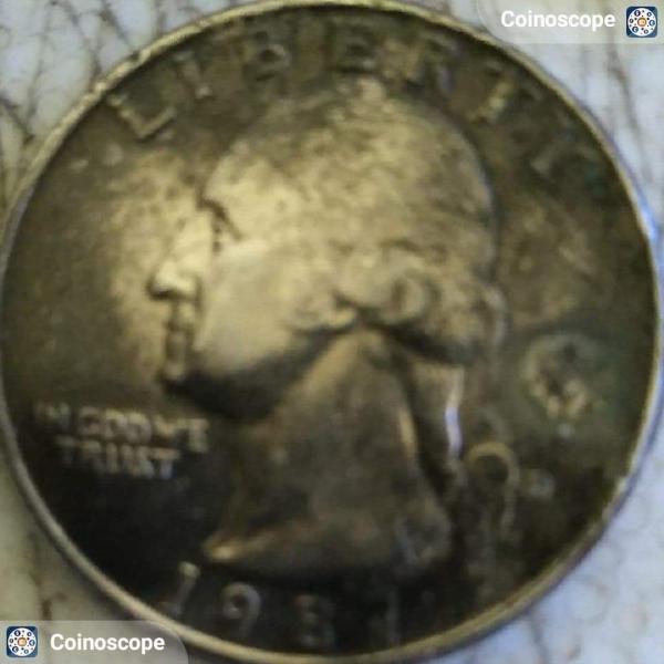 1987 D mint quarter looks like a Capitol…