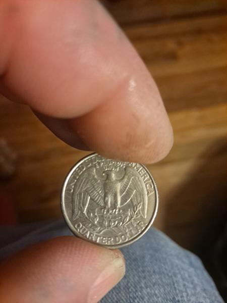 $0.25 US Quarter only markings on the back
