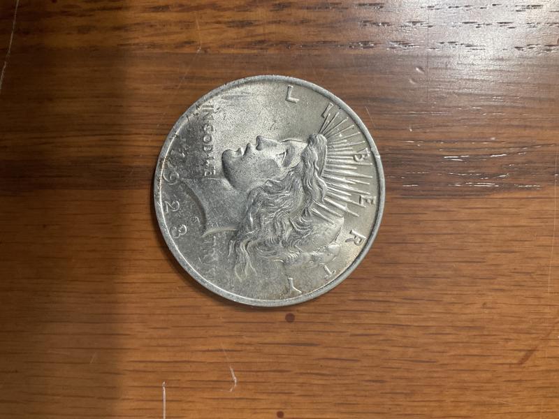 1923 silver dollar. Don’t know much more about it. Looking&hellip;