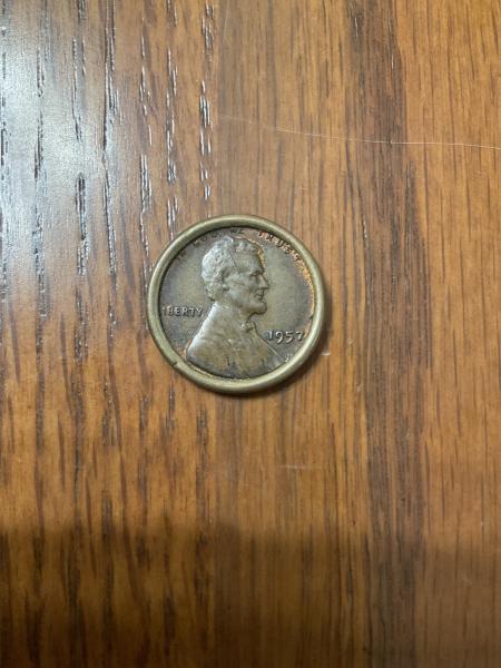 Penny from 1957 with a weird rim around…