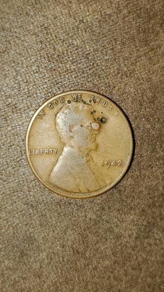 I have a 1942 wheat penny with small…