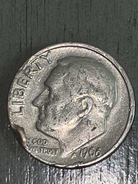 A 1966 U.S. dime with a possible rim error.