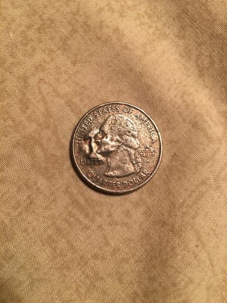 2005 us quarter looks to have something in…