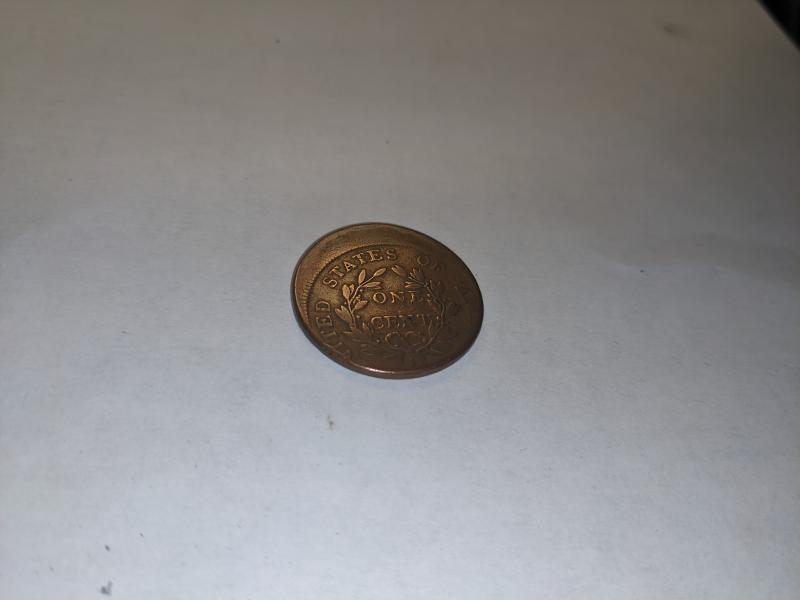 A copper penny from 1803