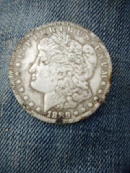 The first two pictures are an 1889 Morgan…