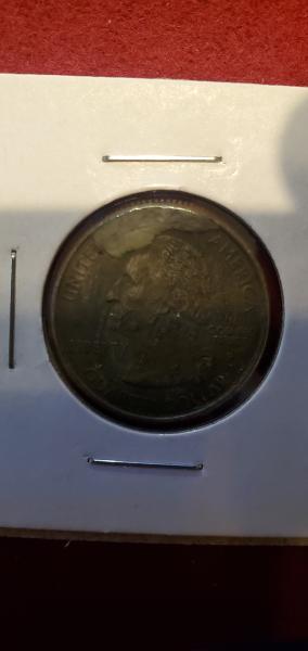 2001 Vermont state quarter with a cud on…