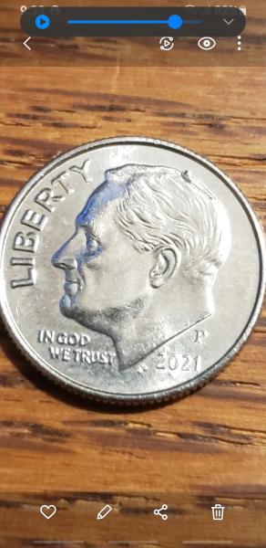 This Roosevelt dime looks like Roosevelt has a…