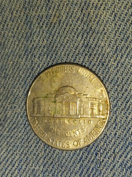 2002 nickel number 7 on right side of…