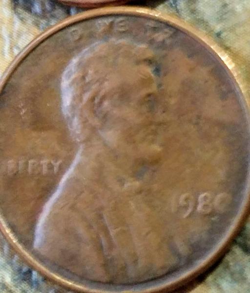 1980 penny is missing letters in section of…