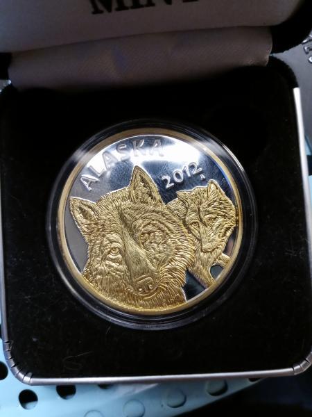 The 2012 medallion was designed by Dr. Gary…