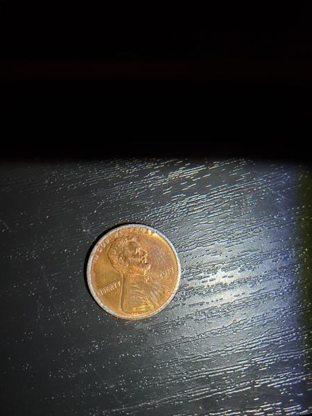 2017 pennie with a silver band on outside…