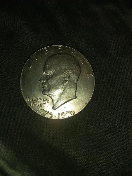 1952 penny and the other is a dollar…