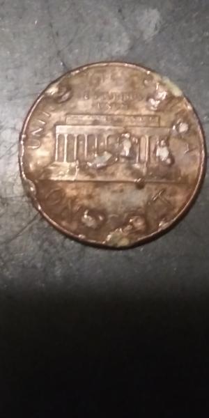 1980? Lincoln penny with many melt marks from…