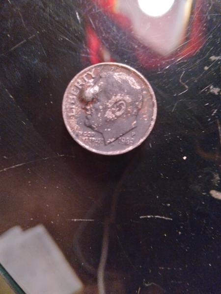 Dime with bulging eyeball