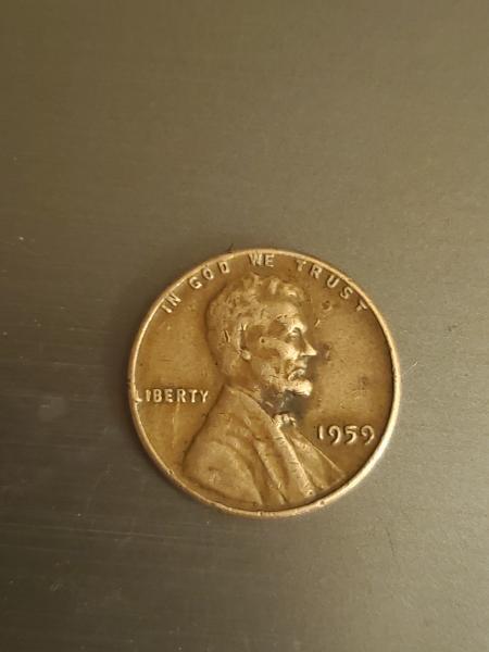 1959 penny, no mint mark. Error on W,&hellip;