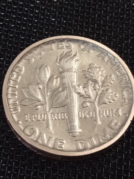 1996D Roosevelt Dime error. Possibly Struck on wrong…