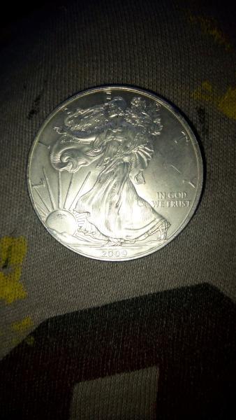 1989 and 2009 1oz silver walking liberty dollars