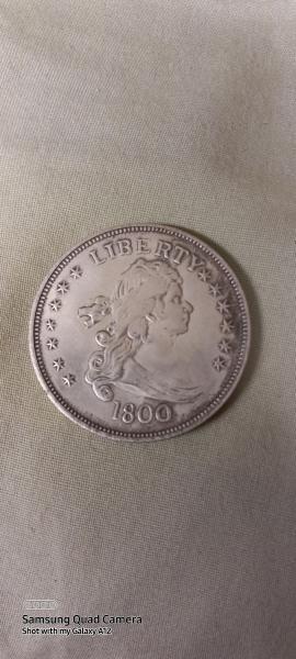 A silver liberty coin from 1800