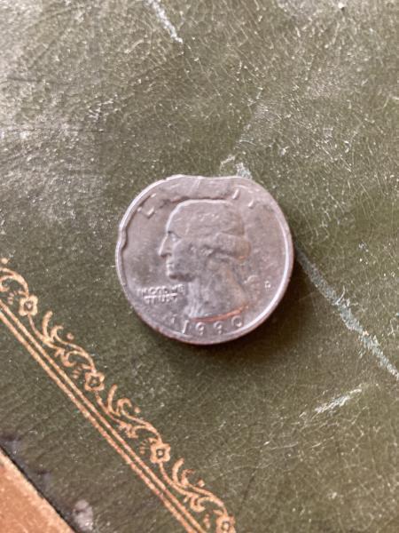 Interesting 1990 quarter with damaged rim with reeding…