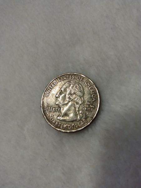A 2005 - P Kansas Washington State Quarter that reads&hellip;