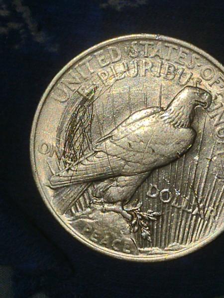 1923 USA 90% silver peace dollar. It appears…