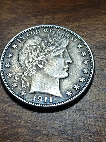1911 half dollar in pretty good condition.