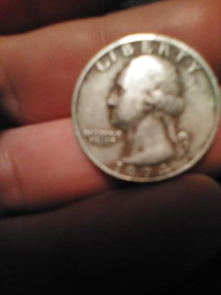 1974 no mint mark black and red quarter?…