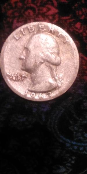 1967 (no mint mark) Washington Quarter.