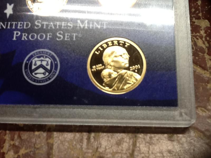Silver feathers (improperly annealing) proof set Sasquatch dollar.