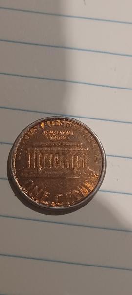 Back of coin even more error and round edge